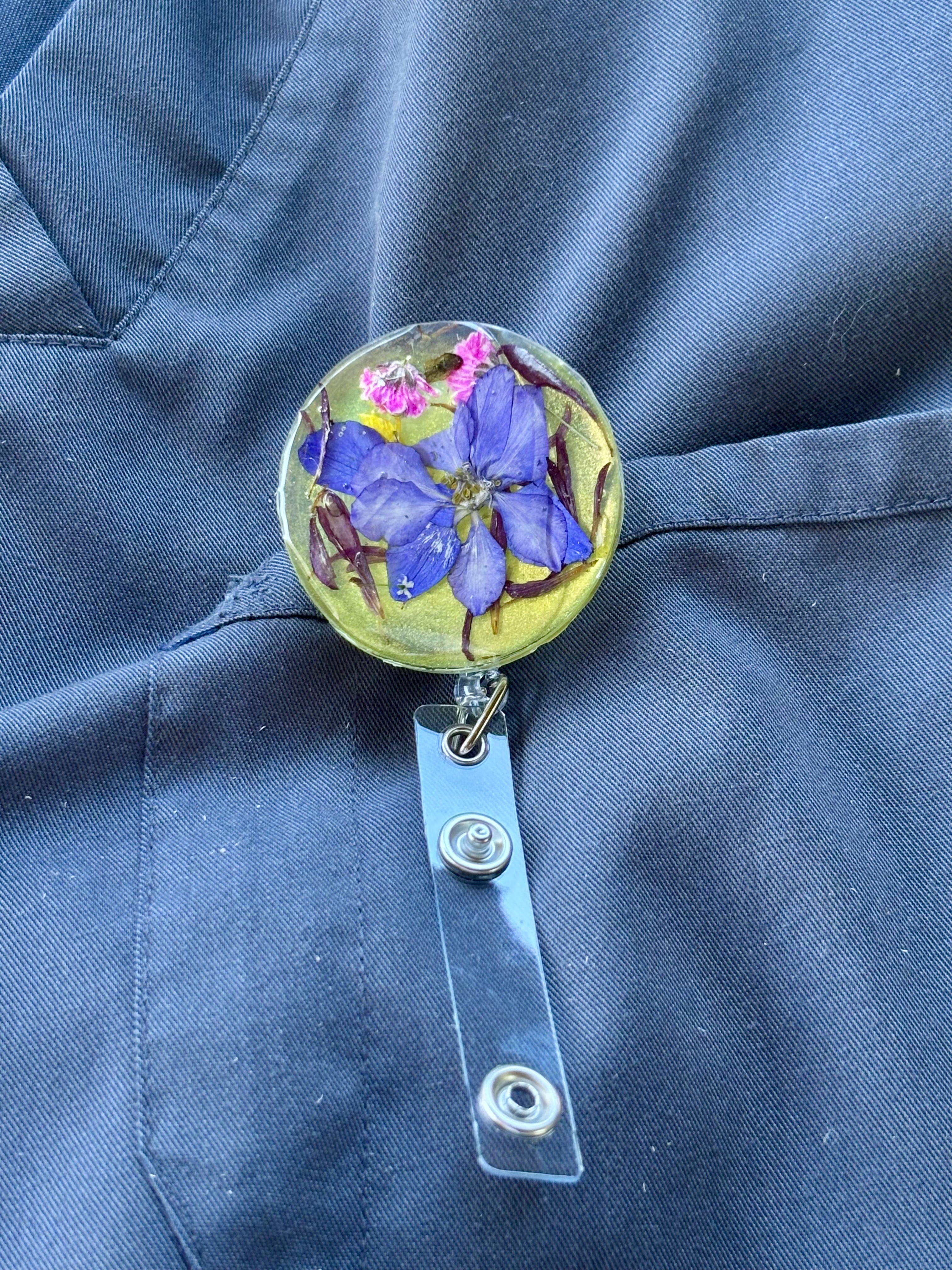 Blue Meadow Bloom Badge Reel