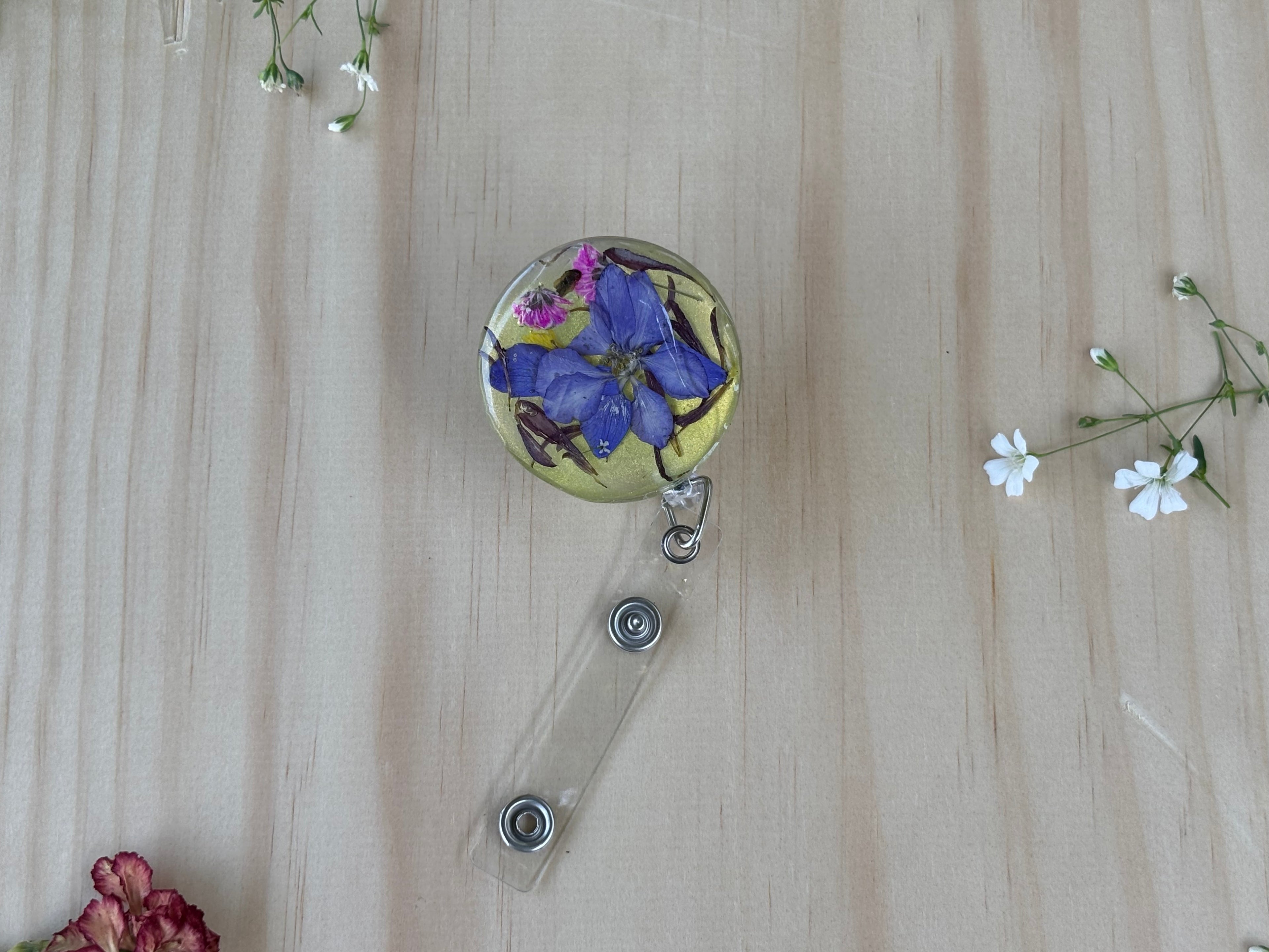 Blue Meadow Bloom Badge Reel
