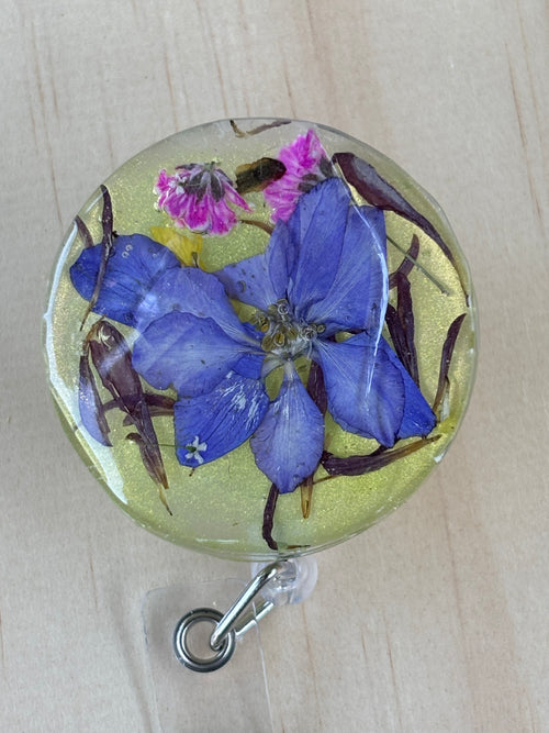 Blue Meadow Bloom Badge Reel